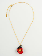 black panther on a poppy flower necklace