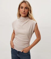 amara mock neck power shoulder top