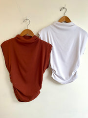 amara mock neck power shoulder top